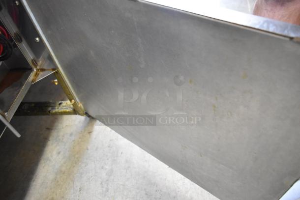 Giles EOF stainless steel 3-bay deep fat fryer, electric, with dumping station, on commercial casters. Model: EOF, 480V.