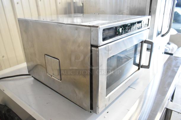 Menumaster MDC182 stainless steel commercial countertop microwave oven, 208/230 volts, 1 phase, visible wear.