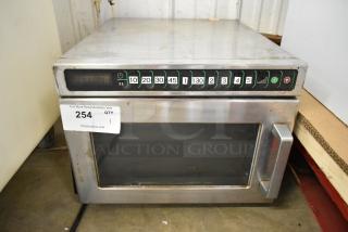 Menumaster MDC182 stainless steel commercial microwave oven with digital controls. 208/230 volts, pre-set buttons visible.