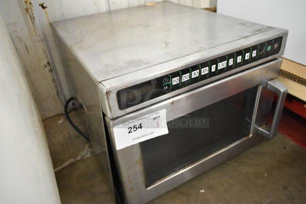 Menumaster MDC182 stainless steel commercial microwave oven with digital controls, visible wear; 208/230 volts, 1 phase.