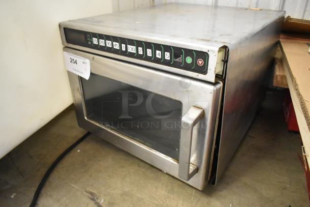 Menumaster MDC182 stainless steel commercial microwave, 208/230V, 1 phase, worn condition, visible control panel.