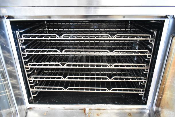Southbend SilverStar convection oven with view-through doors, metal racks, thermostatic controls; stainless steel, full size.