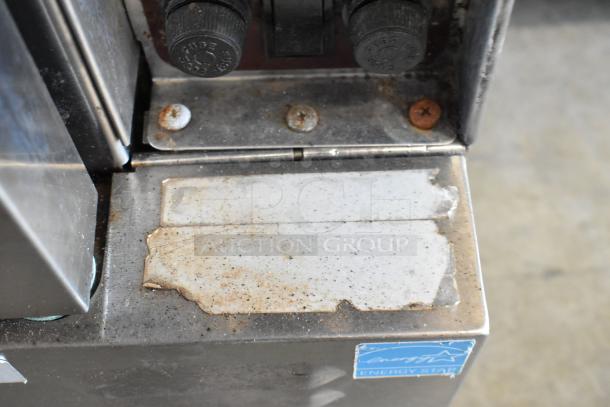 Southbend SilverStar stainless steel convection oven corner, showing surface wear and Energy Star label.