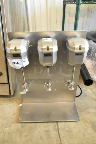 Waring DMC201DCA 3 Head Drink Mixer, stainless steel, 120 volts, 1 phase, with visible model and auction label.