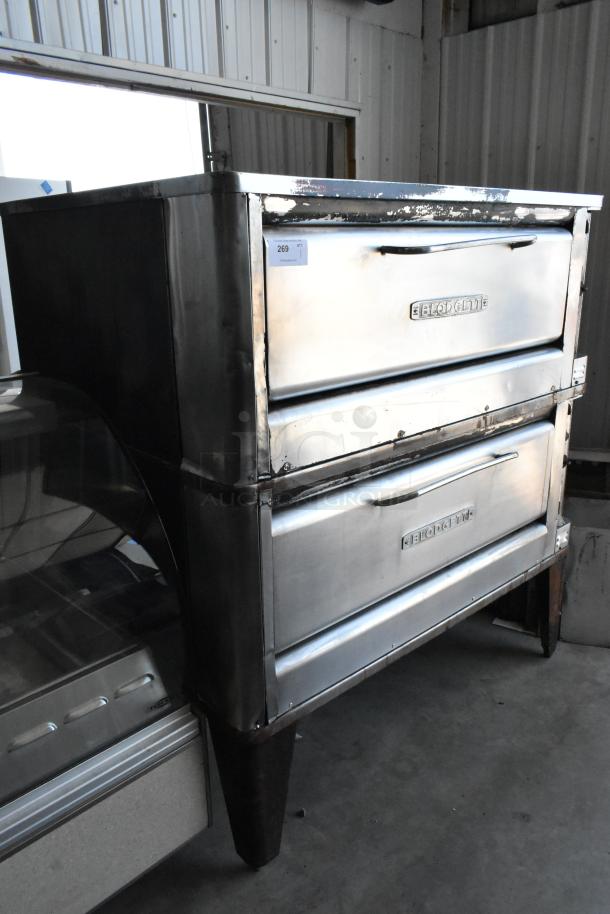 Blodgett 1201-R stainless steel commercial pizza oven, electric-powered, single deck, with cooking stones and metal legs.