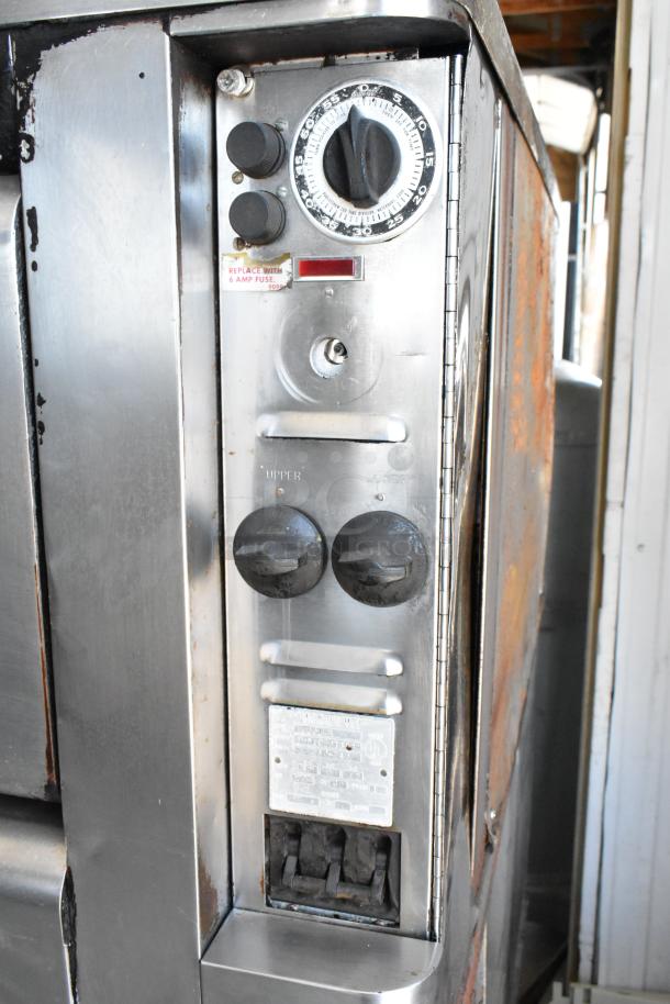 Blodgett 1201-R stainless steel commercial pizza oven with cooking stones, visible timer dial, 230-240V, 1 phase.