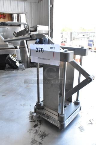 Metal countertop vegetable cutter with stainless steel construction, sturdy base, and lever mechanism. Auction tag "270".