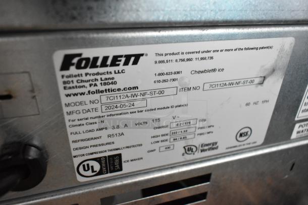 Follett Champion 7 Series ice maker model 7CI112A-IW-NF-ST-00, air-cooled, 7 lb. bin, 115V, 1 phase, label details visible.