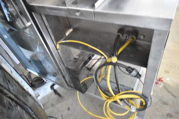 BE&SCO Beta 900 stainless steel tortilla press/oven, natural gas, 240V, 1-phase, visible yellow power cables.