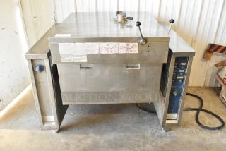 Electrolux stainless steel commercial braising pan, floor style, 208 volts, 3 phase, with visible control panels and labeling.