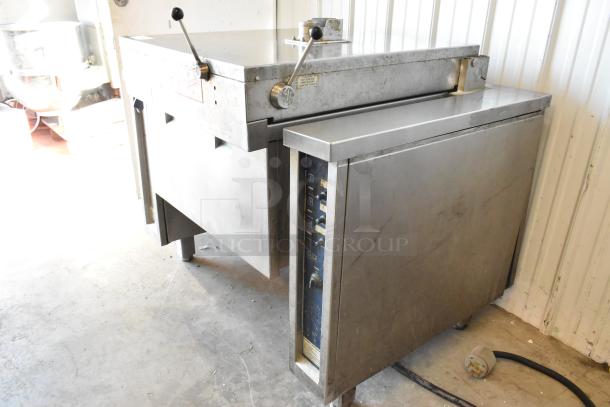 Electrolux Stainless Steel Commercial Braising Pan, floor style, 208V, 3-phase, features levers and control panel, used condition.