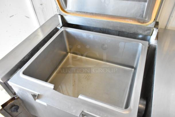 Electrolux stainless steel commercial braising pan, floor style, 208 volts, 3 phase, open lid, excellent condition.