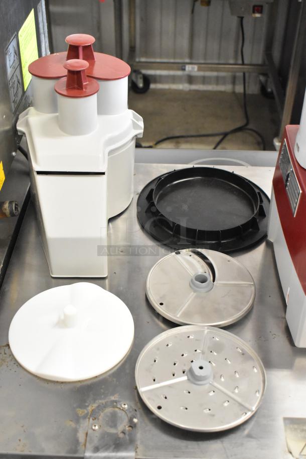 Brand new Robot Coupe R2 food processor with 3 qt. gray bowl, continuous feed, and 3 blades. 120V, 1 phase, slight dents.
