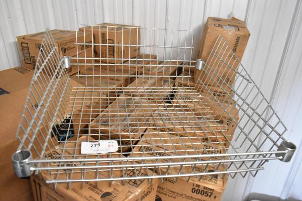 7 metal wire basket style shelves, silver finish, sturdy construction; ideal for storage; tag displays "275."
