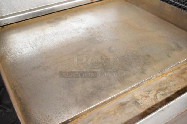 Imperial Stainless Steel Commercial Gas Range, 6 Burners, Right Side Flat Top Griddle, 2 Ovens, Over Shelf, Backsplash.