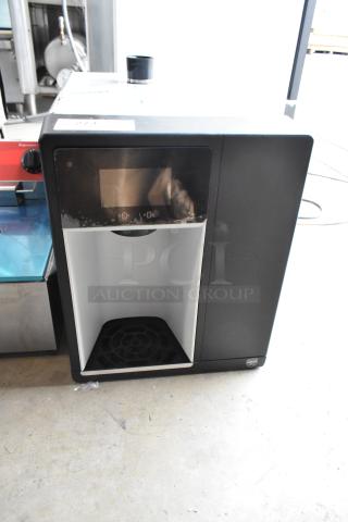 Follett 7CI112A-IW-NF-ST-00 ice maker and water dispenser, 7 lb. bin, 100 lb. capacity, air-cooled, countertop model.