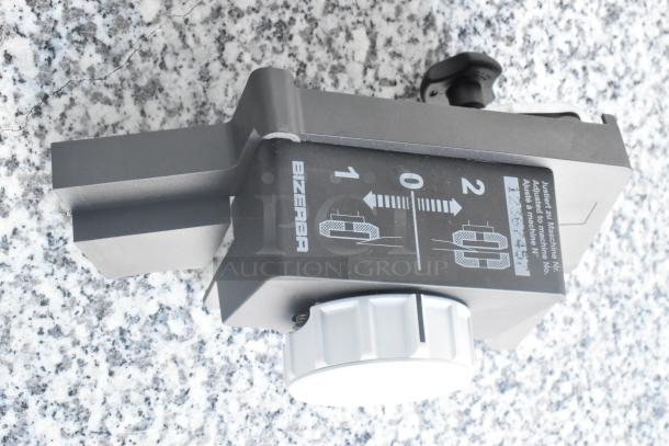 2023 Bizerba GSP HD meat slicer part with labeled adjustment dial. Metal, commercial-grade; 120 Volts, 1 Phase.