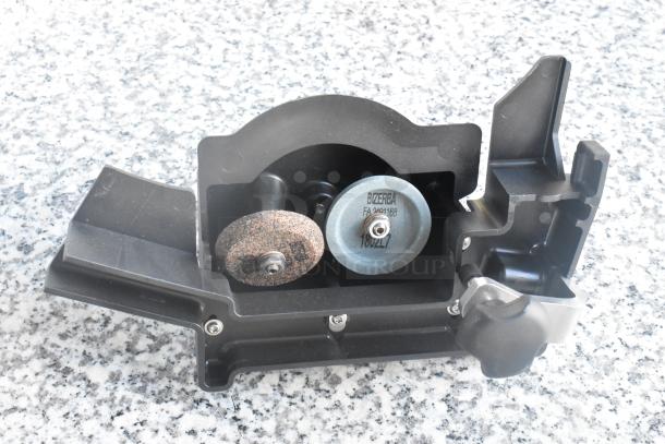 2023 Bizerba GSP HD meat slicer blade sharpener attachment. Visible Bizerba label and model marking.