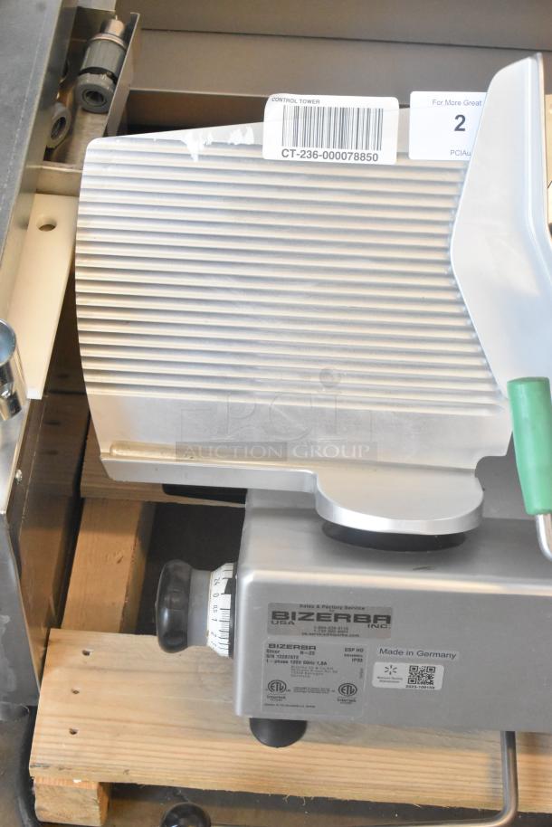 2023 Bizerba GSP HD metal meat slicer with blade sharpener, 120 volts, 1 phase, model markings visible, made in Germany.