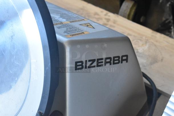 2023 Bizerba GSP HD meat slicer, metal, with blade sharpener, visible logo. Condition appears good. 120V, 1 Phase.