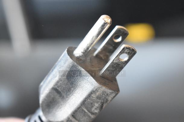 2023 Bizerba GSP HD meat slicer plug. 120V, 1 phase. Durable, reliable for commercial use. Plug shown for voltage compatibility.