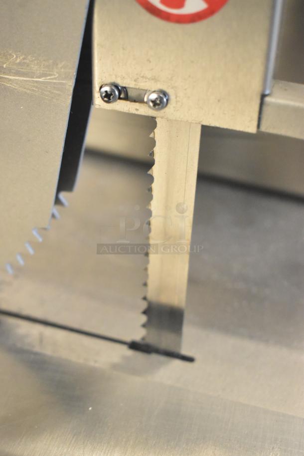 Brand new Avantco 177EMBS94SS stainless steel vertical band meat saw, 94" blade, 3 hp, 220/240V, 3 phase, minor scratches.