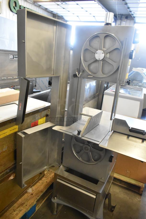 Brand new Avantco 177EMBS94SS stainless steel commercial meat saw, 94" blade, 3 hp, 220/240V, 3 phase. Scratch and dent item.