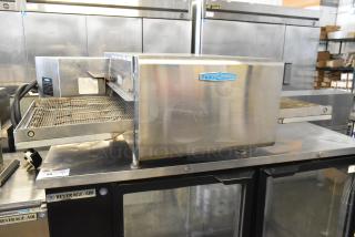 2018 Turbochef HhC2020 stainless steel rapid cook conveyor oven. Electric, 208/240V, 3 phase. Clean, commercial use.