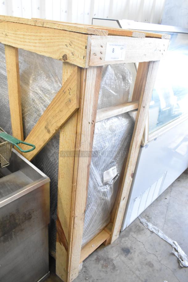 BRAND NEW 2022 Sierra FRYSTAR400 stainless steel deep fat fryer, natural gas, wrapped in protective packaging with minor dents.