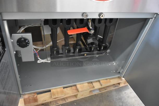 Brand new Avantco 177FBF2624NG stainless steel commercial fryer, 150-170 lb. capacity, 120,000 BTU, natural gas powered.