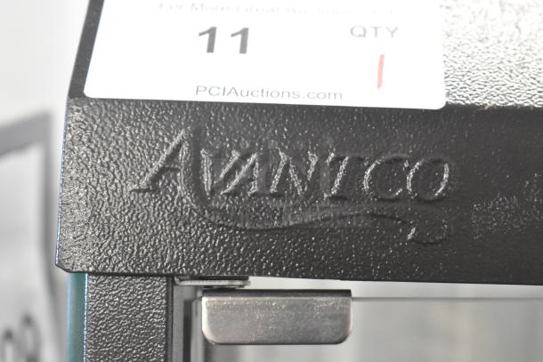 Brand new Avantco 177HDC13 metal commercial heated display case with hinged doors, 15", 3 shelves, 120V, with scratch and dent.