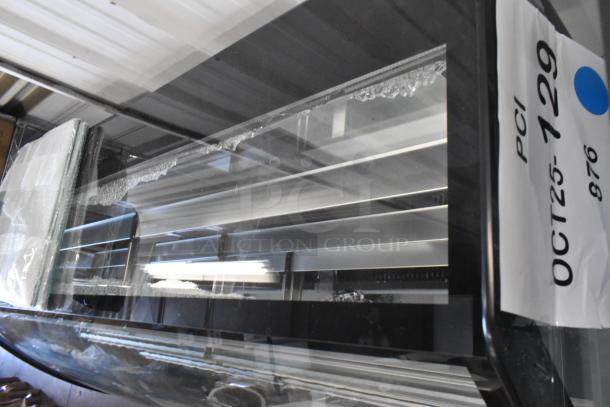 Brand new 2024 Avantco 193BCTD72B 72" black bakery display case. Notable broken glass; 115 Volts, LED lighting, casters.