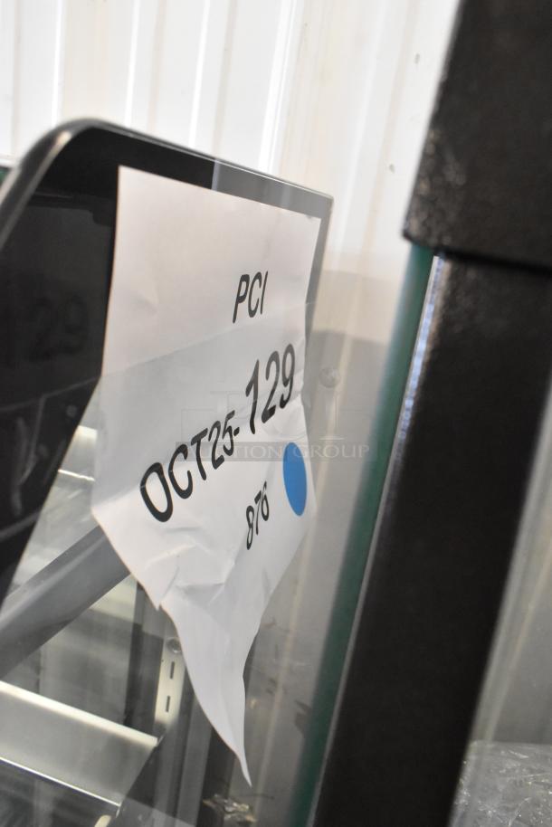 Avantco 193BCTD72B dry bakery display case with visible broken glass, LED lighting, and PCI tag reading "OCT25-129."