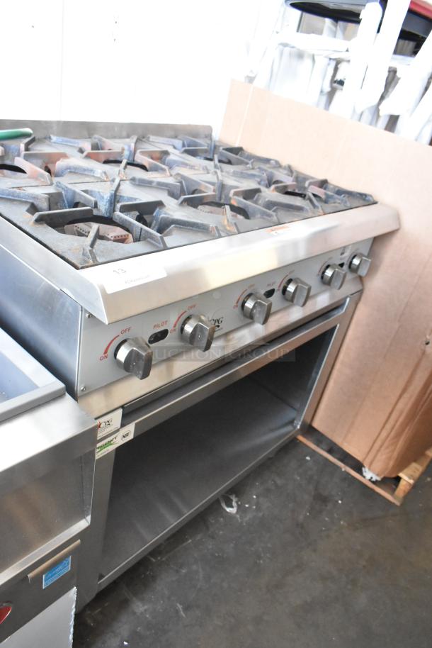 Brand new 2023 CPG stainless steel 6-burner gas range, model 351RCPG36NL, on Regency stand, 132,000 BTU. Scratch and dent condition.