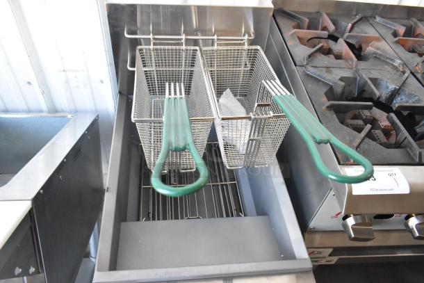Stainless steel Avantco 177EF40B commercial floor fryer, 40 lb capacity, two metal fry baskets, new condition, 208V, 1 phase.