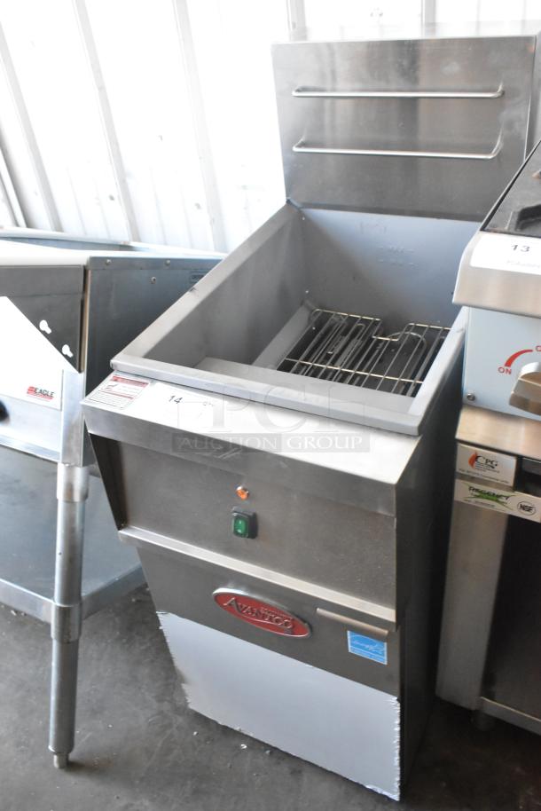 Brand new Avantco 177EF40B 40 lb. stainless steel electric floor fryer with 2 metal baskets, 208V, 1 phase, slight dents.