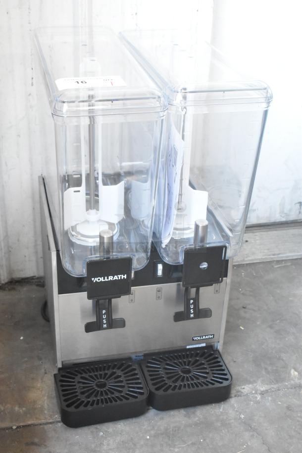 Brand new Vollrath VBBE2-37-S stainless steel beverage dispenser; double 5.28-gallon bowls, stirring paddles. Scratch and dent.