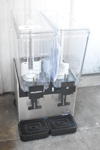 Brand new Vollrath VBBE2-37-S stainless steel beverage dispenser; double 5.28-gallon bowls, stirring paddles. Scratch and dent.