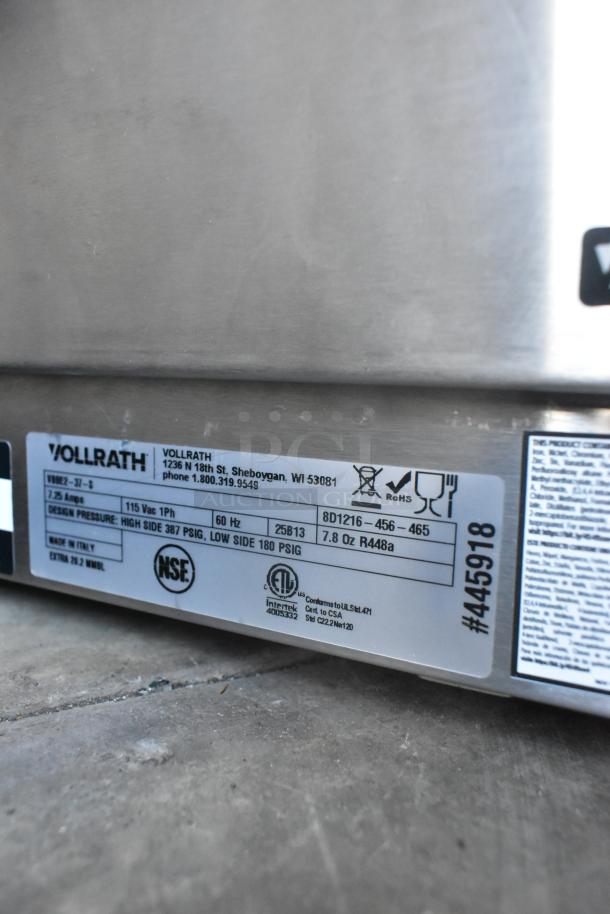 BRAND NEW Vollrath VBBE2-37-S stainless steel beverage dispenser, 5.28-gallon double bowl, 115V, 1 phase, with label details.