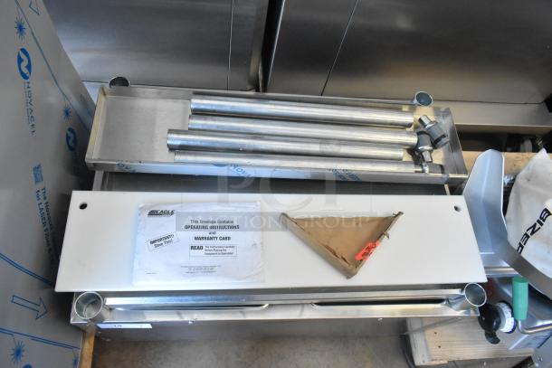 Brand new Eagle DHT2-120 stainless steel two-pan electric steam table. Includes operating instructions and warranty card.
