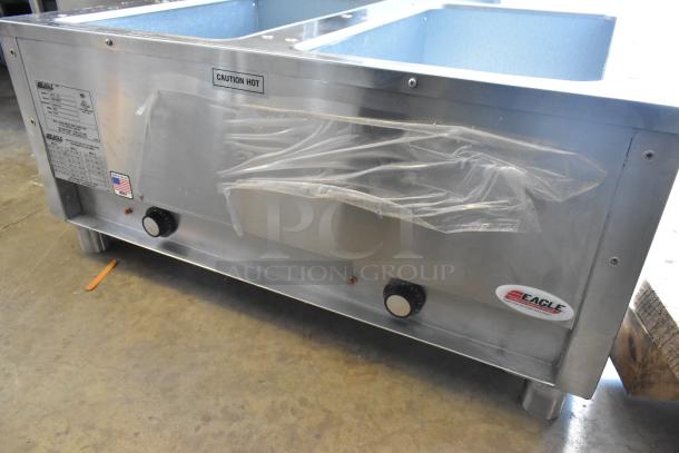 Eagle DHT2-120 two pan electric steam table, stainless steel, 120V, new with minor scratches, features caution hot label.