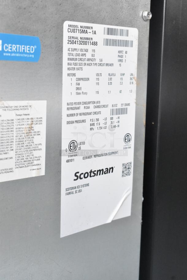 Scotsman CU0715MA-1A ice machine label, showing model, serial number, specifications, and ETL certification. Stainless steel.
