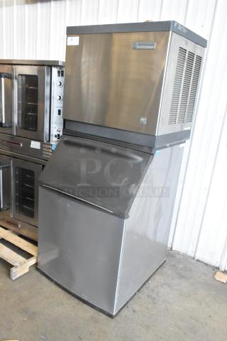 Scotsman CME506AS-32F stainless steel ice head on Hoshizaki B570 bin. 208/230V, 1 Phase. Used, good condition.