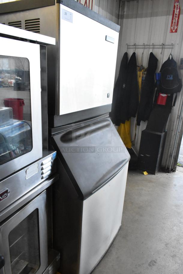 Scotsman CME506AS-32F ice head on Hoshizaki B570 bin, stainless steel, 208/230V, 1 phase. Commercial, good condition.