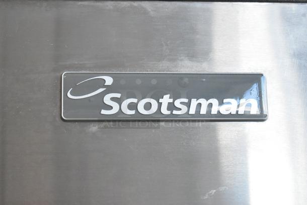 Scotsman CME506AS-32F stainless steel ice maker on Hoshizaki B570 bin, 208/230V, 1-phase, logo visible.