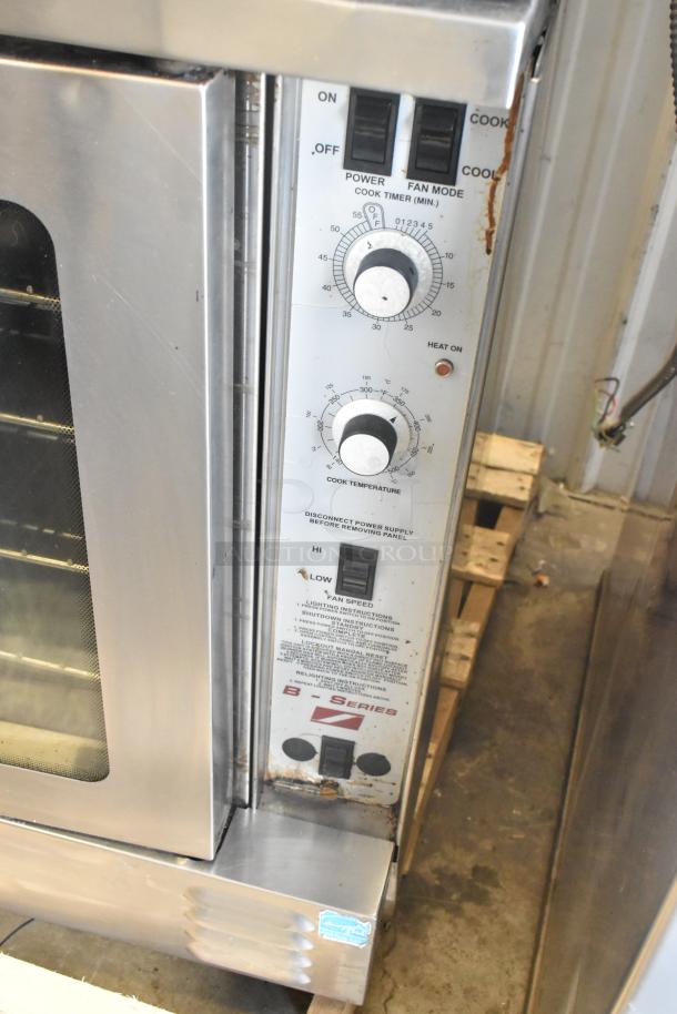 Southbend B Series stainless steel commercial convection oven, view-through doors, metal racks, thermostatic controls visible.