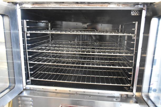 Southbend B Series stainless steel commercial convection oven, view-through doors, metal racks, thermostatic controls.