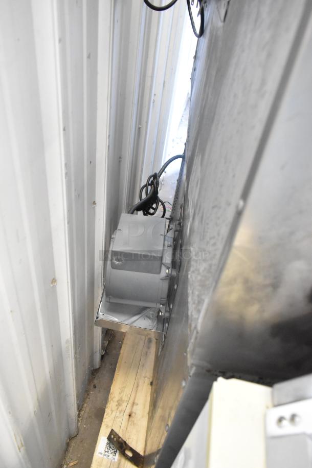 Southbend B Series commercial oven, stainless steel, convection type, with metal racks and thermostatic controls, side view.