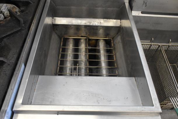 Globe GFF35G stainless steel commercial deep fat fryer with 2 metal fry baskets, natural gas powered, 90,000 BTU.