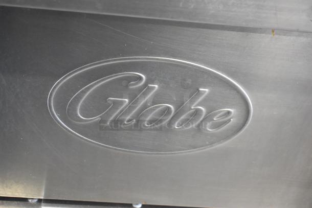 Globe GFF35G stainless steel commercial deep fat fryer, 90,000 BTU, with 2 metal fry baskets. Globe logo embossed on front.